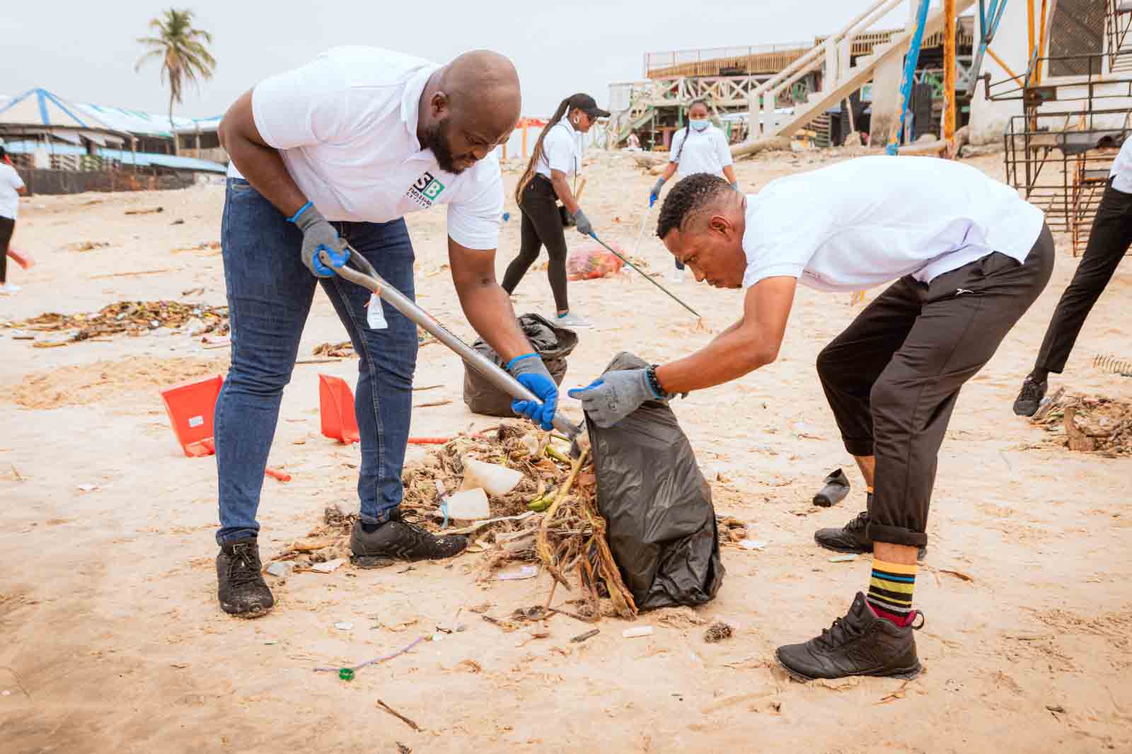 Clearing debris along the shoreline